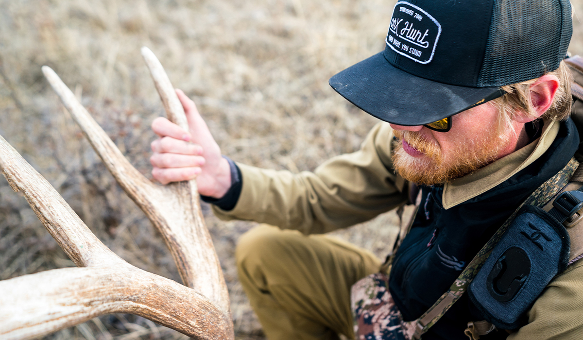 Montana hunting photographer and onX Ambassador Steven Drake with an elk shed found while shed hunting. Montana hunting photographer and onX Ambassador Steven Drake with an elk shed found while shed hunting.