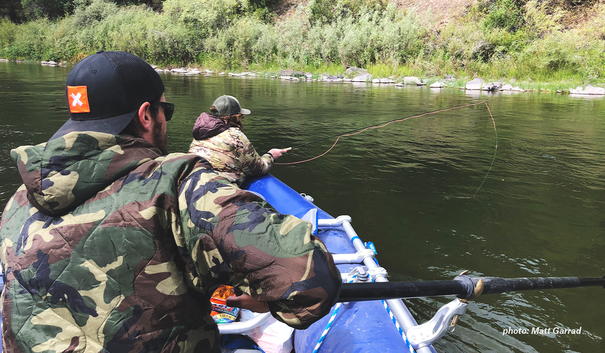Army veteran and onX staffer Zach Condon fishing in his raft with a friend. Army veteran and onX staffer Zach Condon fishing in his raft with a friend.