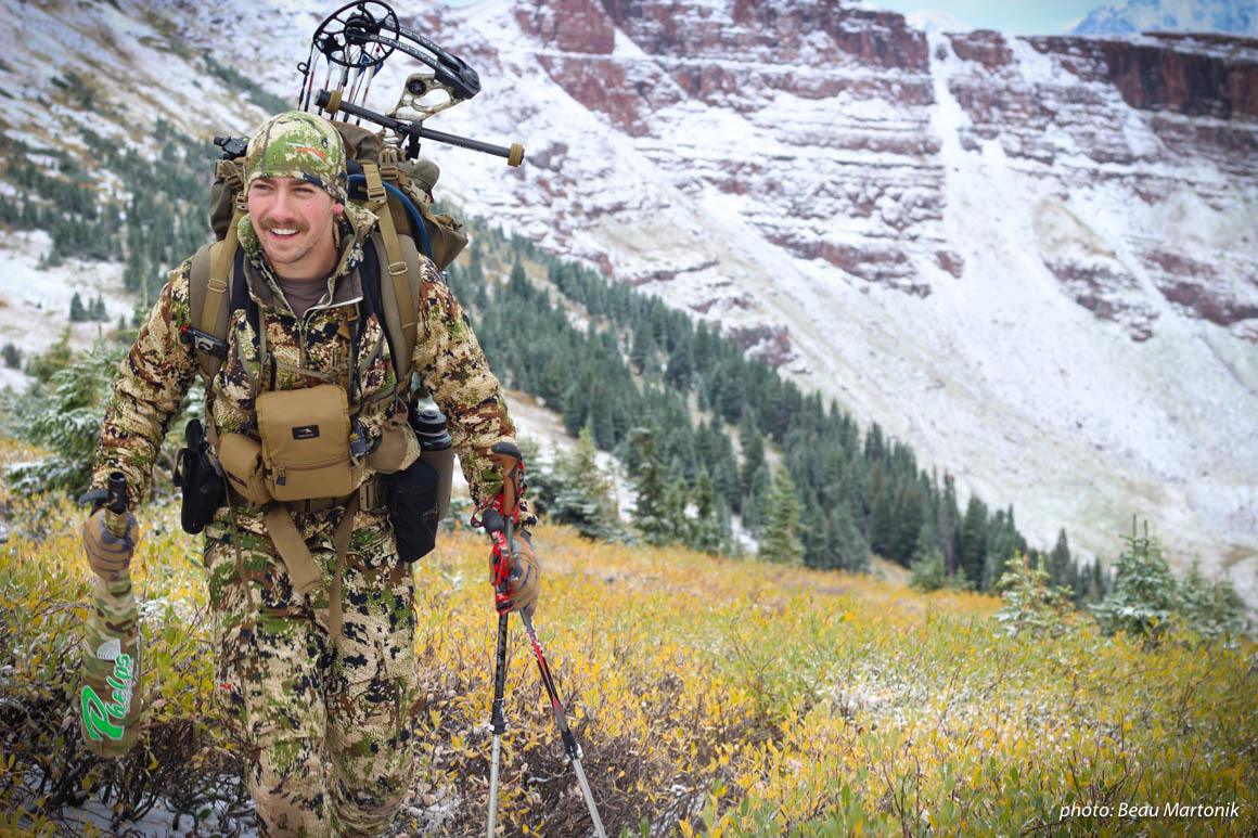 Man climbing mountains while hunting in the mountains. Man climbing mountains while hunting in the mountains.