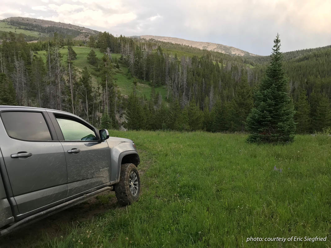 Muddy truck parked near the mountains of Montana. Muddy truck parked near the mountains of Montana.