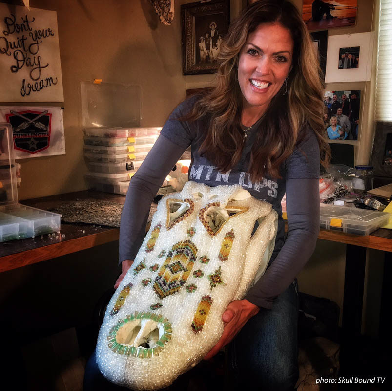 Jana Waller with a crystal decorated animal skull. Jana Waller with a crystal decorated animal skull.