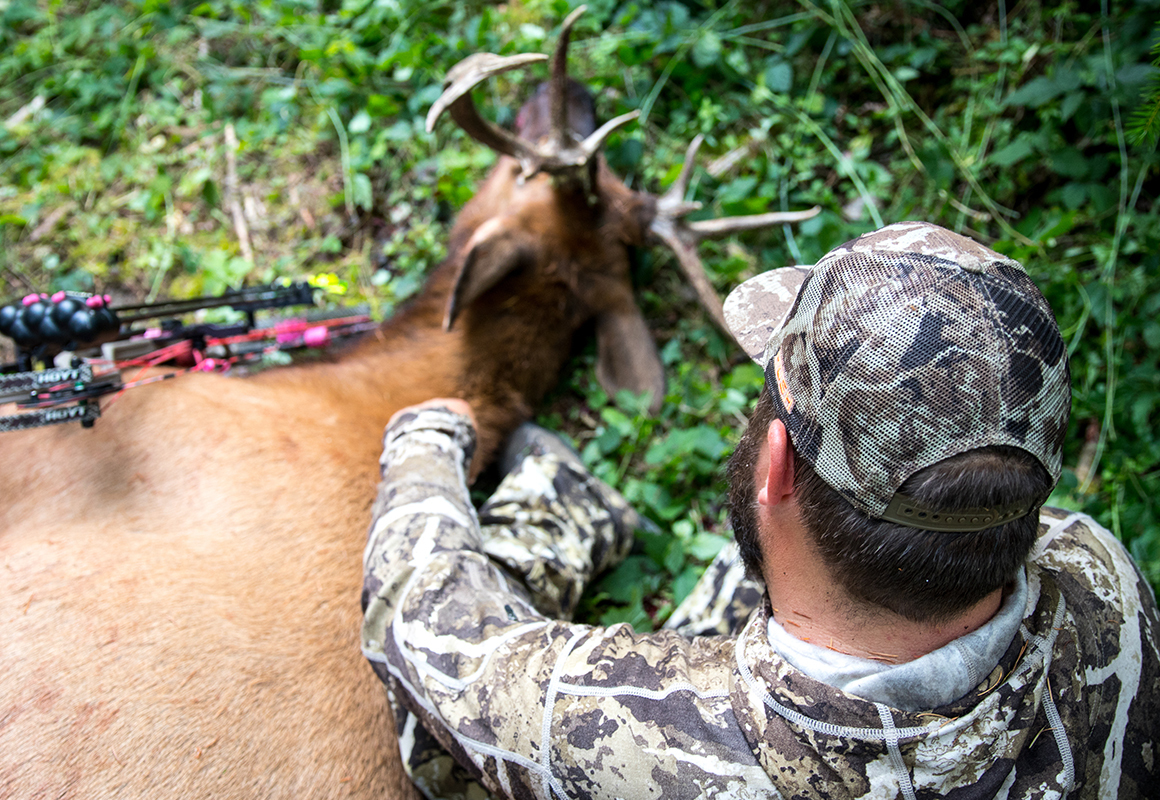 Man with elk shot while bowhunting using onX Hunt Possible Access Layer. Man with elk shot while bowhunting using onX Hunt Possible Access Layer.
