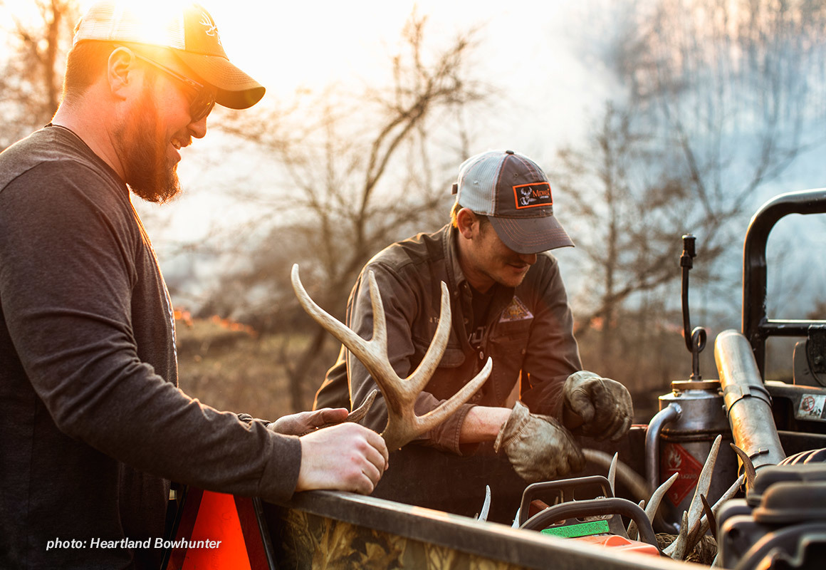 Two men shed hunting in the springtime. Two men shed hunting in the springtime.